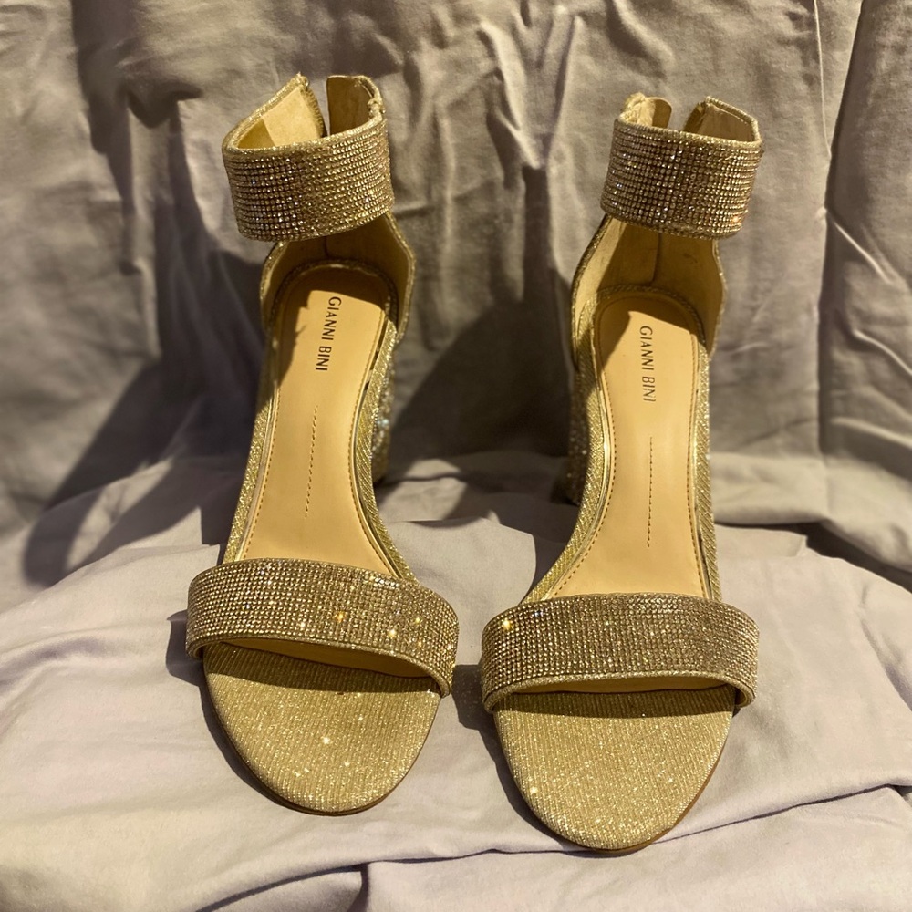 Gold shiny high heels